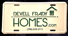 DEVELL FRADY HOMES-EMBOSSED LICENSE PLATE / SIGN 12X6 INCHES NEW