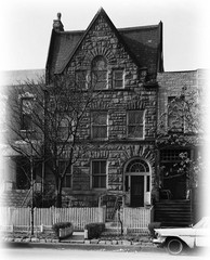 narrow lot Romanesque style home, architectural drawings, stone details