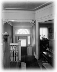 narrow lot Romanesque style home, architectural drawings, stone details