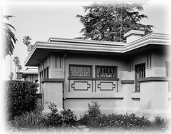 Prairie Style single story home, broad overhangs, leaded glass, printed plans