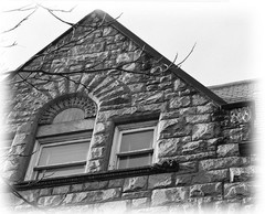narrow lot Romanesque style home, architectural drawings, stone details