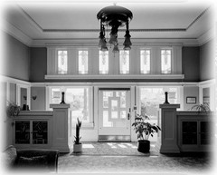 Prairie Style single story home, broad overhangs, leaded glass, printed plans