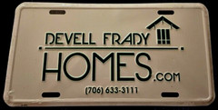 DEVELL FRADY HOMES-EMBOSSED LICENSE PLATE / SIGN 12X6 INCHES NEW