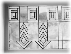 Prairie Style single story home, broad overhangs, leaded glass, printed plans