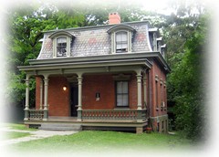 Victorian brick cottage with porches and dormers, architectural printed plans