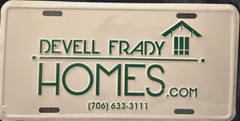 DEVELL FRADY HOMES-EMBOSSED LICENSE PLATE / SIGN 12X6 INCHES NEW